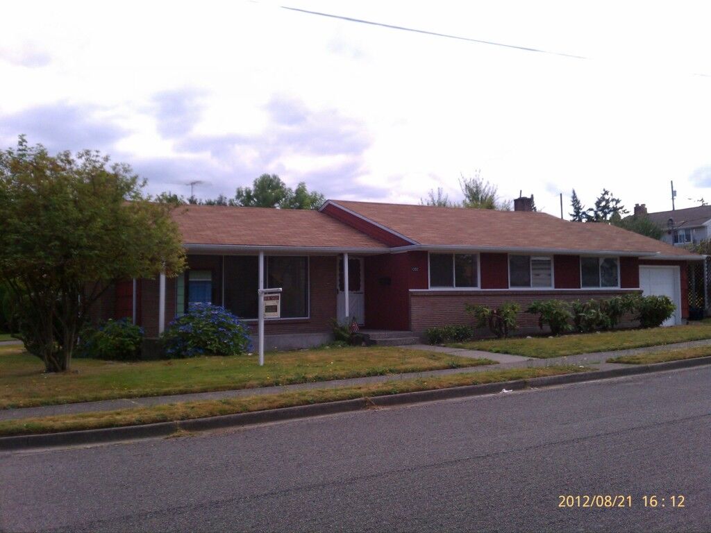 Property Photo:  1202 S 64th St  WA 98408 