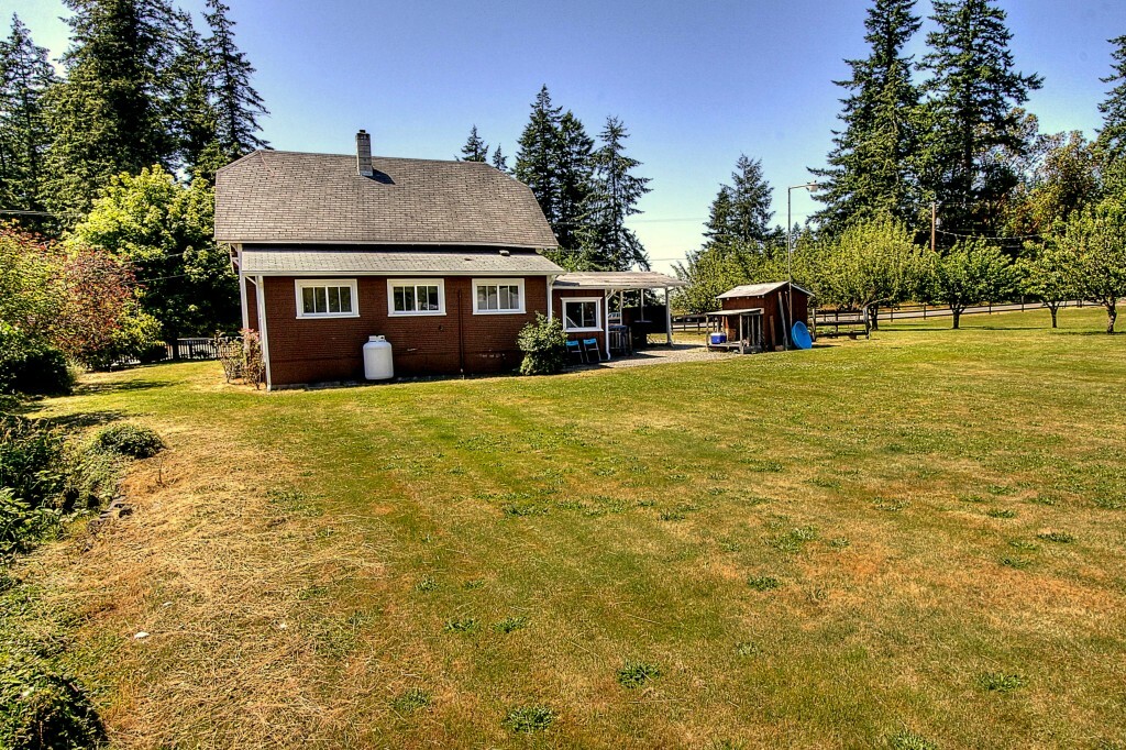 Property Photo:  205 Island Blvd Fi  WA 98333 