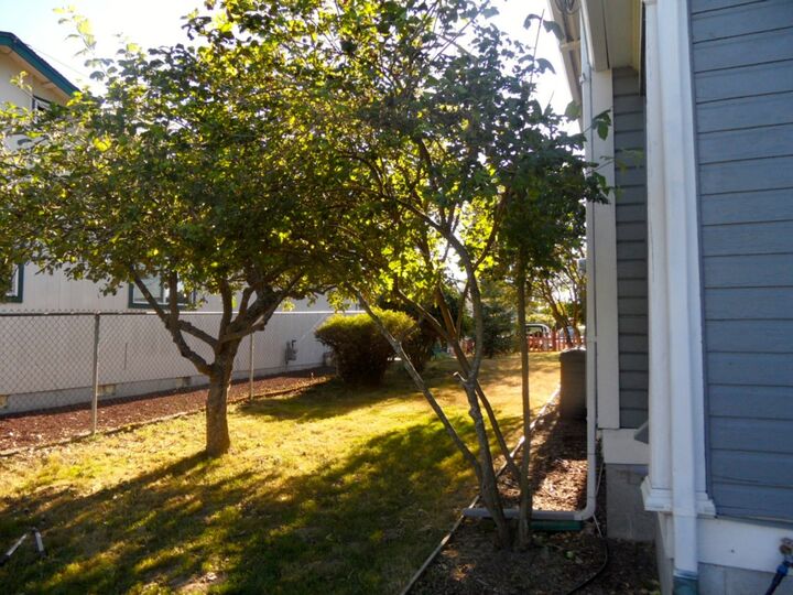Property Photo:  8227 S Bell St  WA 98408 