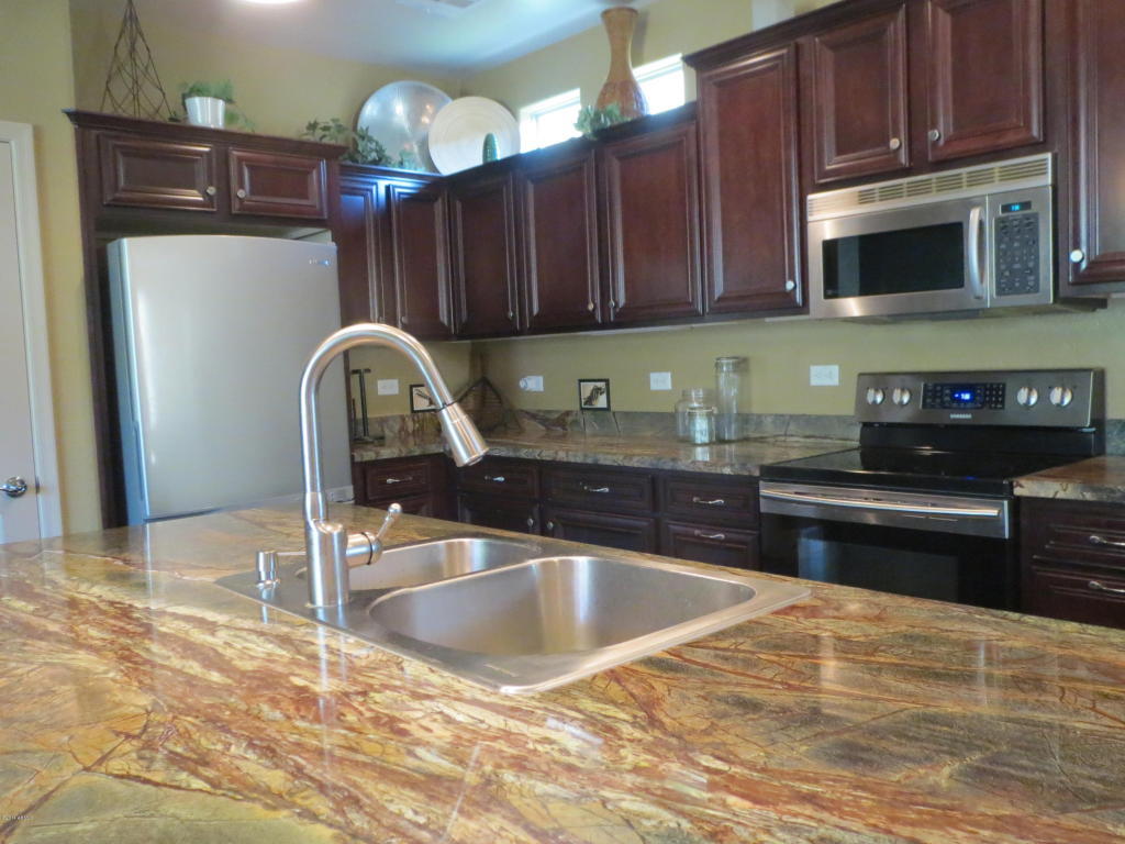 Property Photo: 15494 W Dahlia Drive AZ 85379
