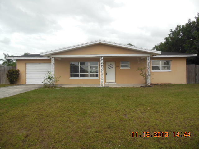 Property Photo:  205 W Arbor Avenue  FL 34952 