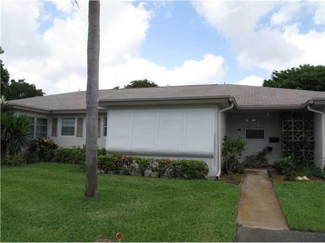 Property Photo:  1412 High Point Way C  FL 33445 