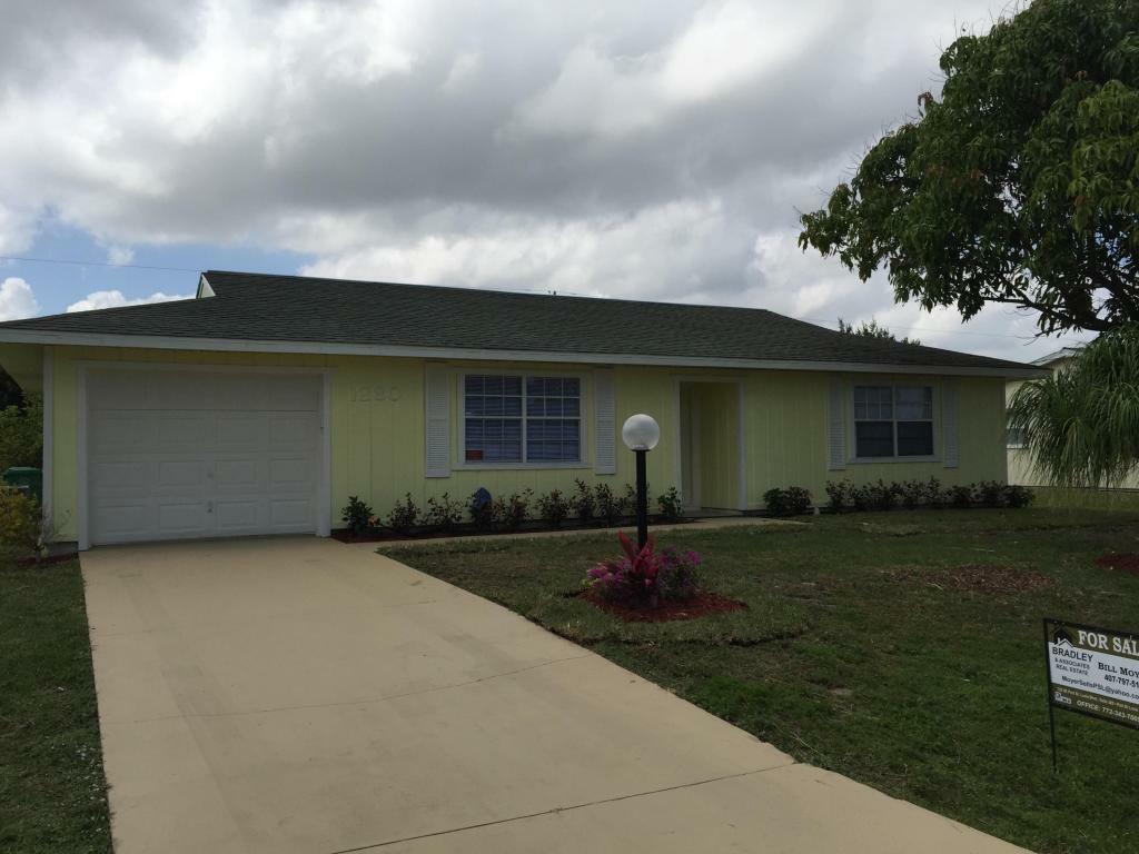 Property Photo:  1280 SW Avens Street  FL 34953 