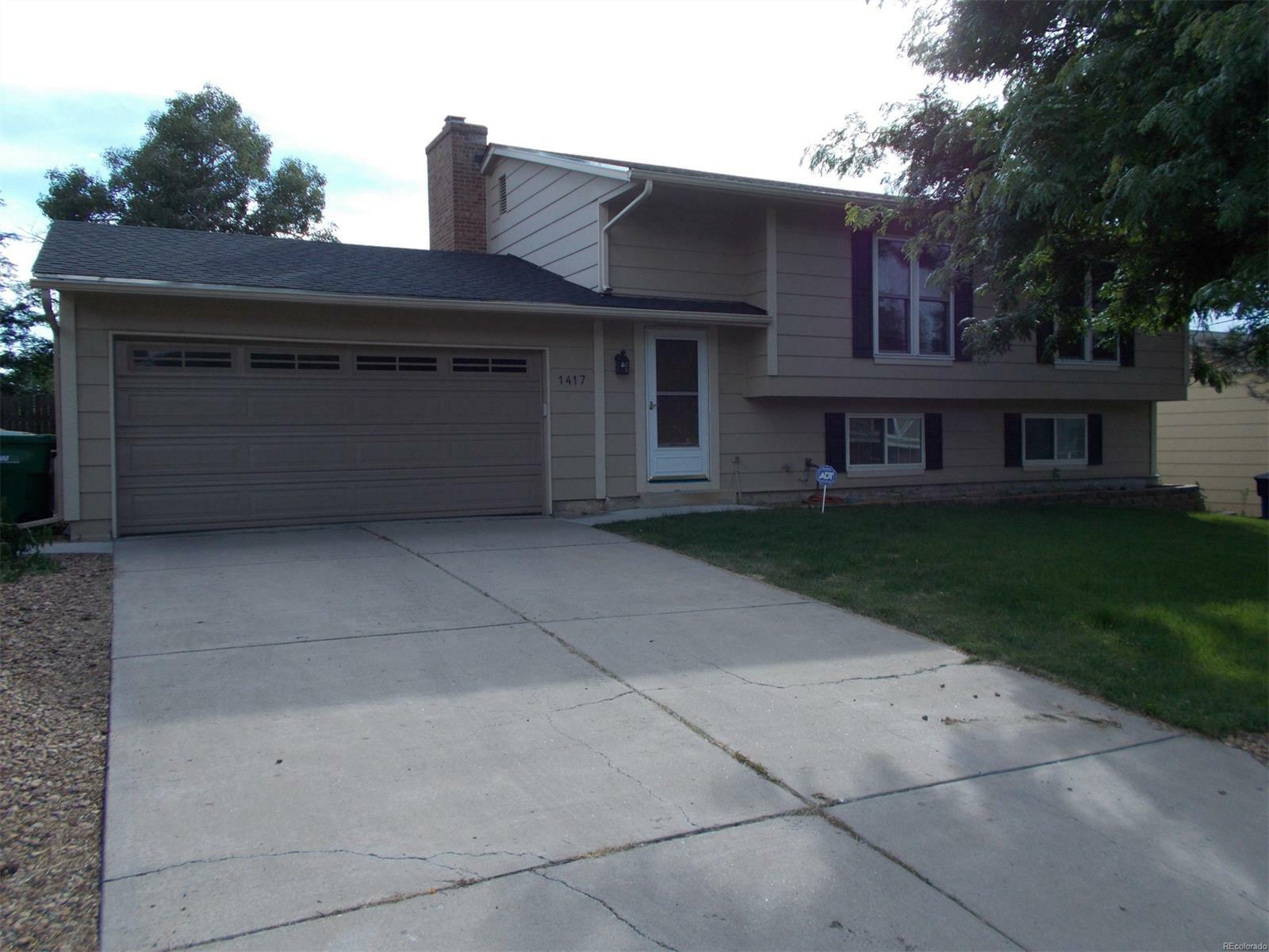 Property Photo:  1417 South Olathe Way  CO 80017 