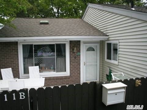 Property Photo:  211 Springmeadow B  NY 11741 