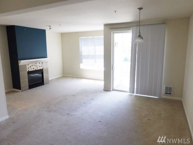 Property Photo:  23420 SE Black Nugget Rd C201  WA 98029 