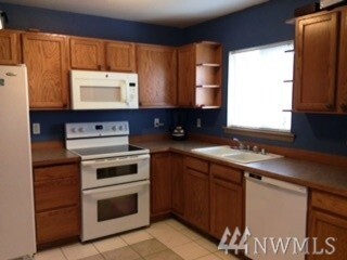 Property Photo: 1314 E Harrison St WA 98404