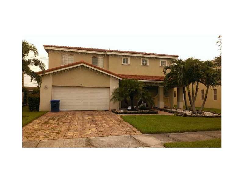 Property Photo: 1124 NW 204 St FL 33169