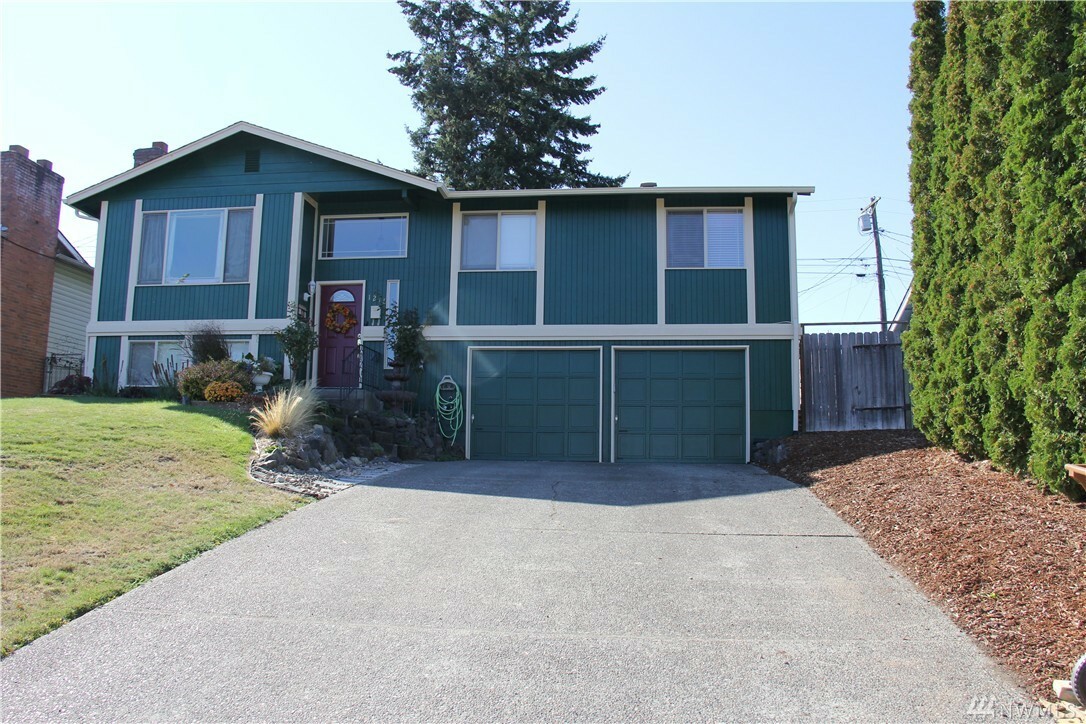 Property Photo:  1216 S Highland Ave  WA 98465 