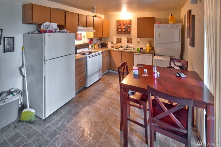 Property Photo:  2076 E 56th St E1-E4  WA 98404 