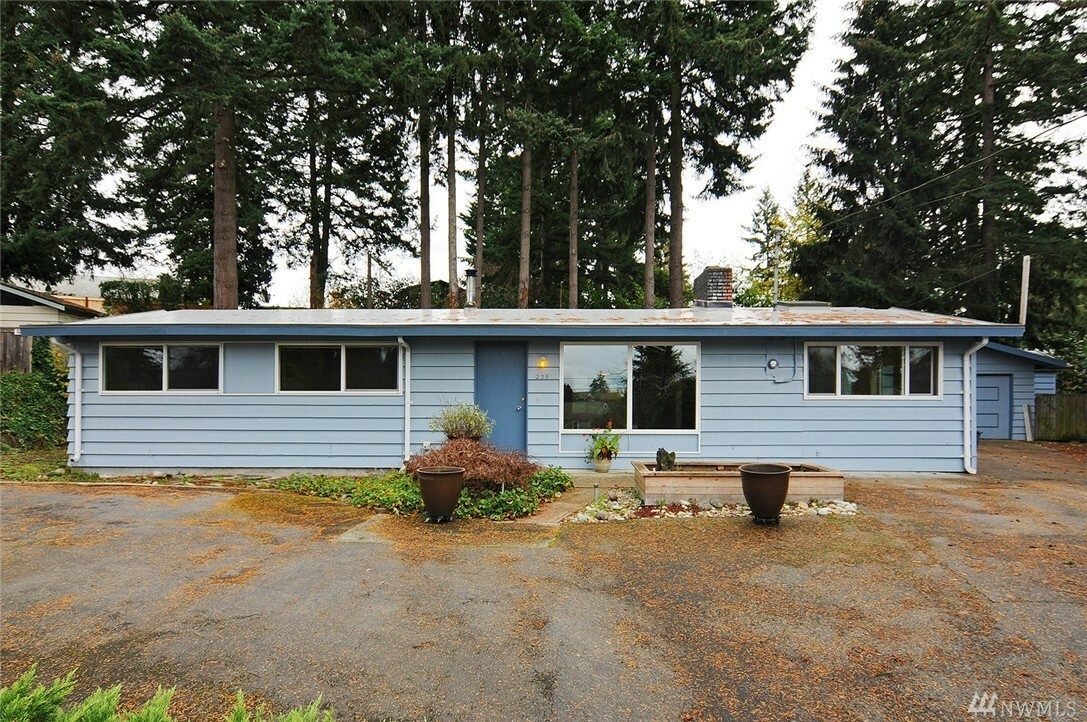 Property Photo:  235 S 196th Place  WA 98148 