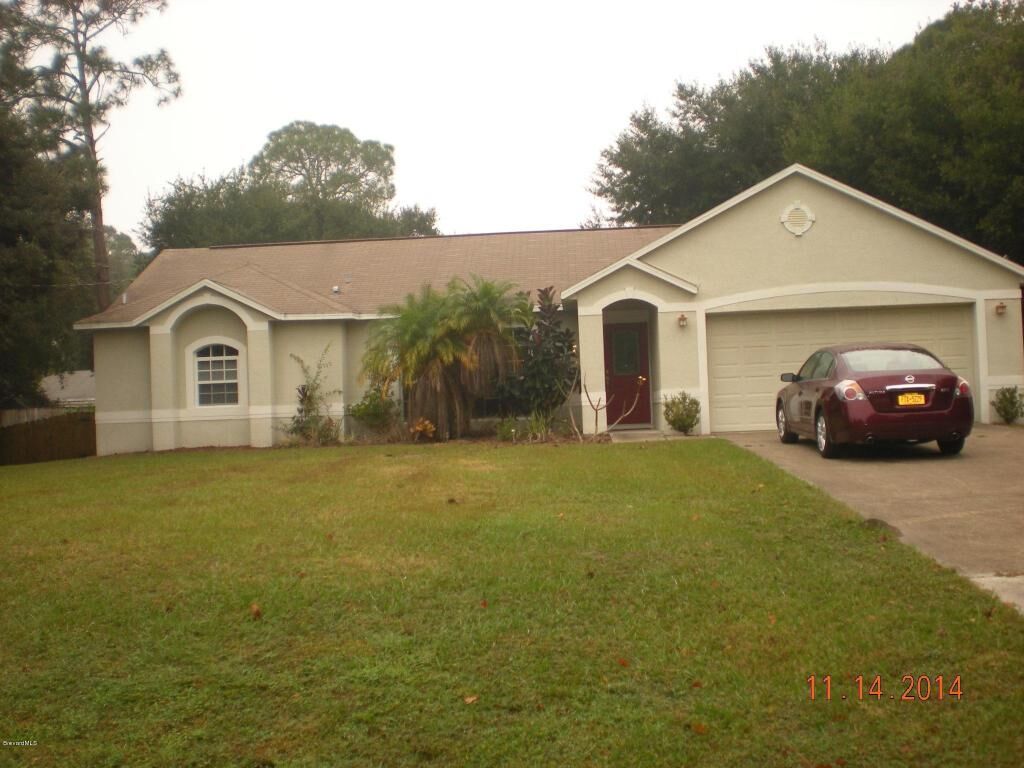 Property Photo:  6480 Muller Avenue  FL 32927 