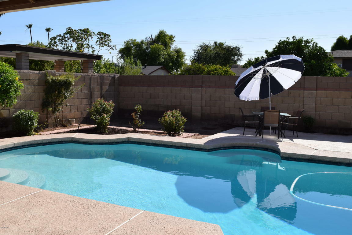 Property Photo:  1118 N Hunt Drive  AZ 85203 