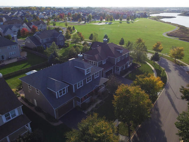 Property Photo:  704 Versailles Parkway  IL 60543 