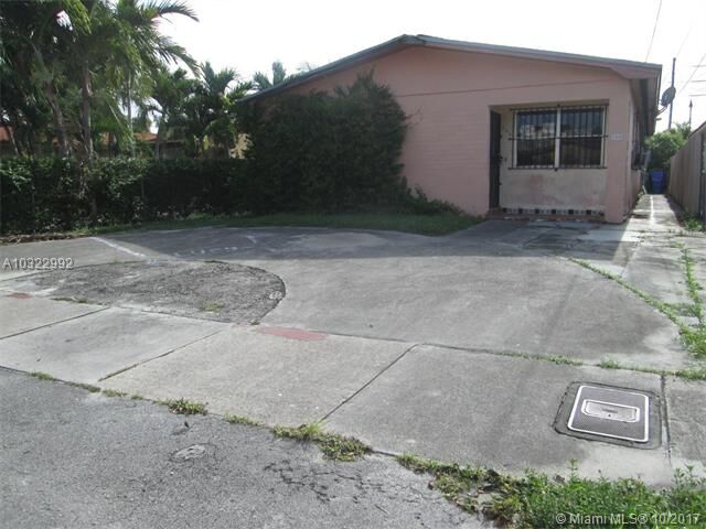 Property Photo:  250 NW 61st Ave  FL 33126 
