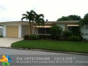 Property Photo:  1450 NW 67th Ave  FL 33063 