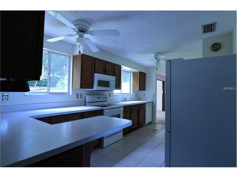 Property Photo:  10900 Crescent Ln  FL 34711 