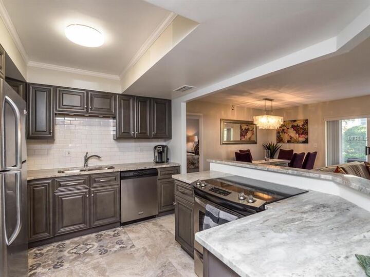 Property Photo:  800 Benjamin Franklin Drive 104  FL 34236 