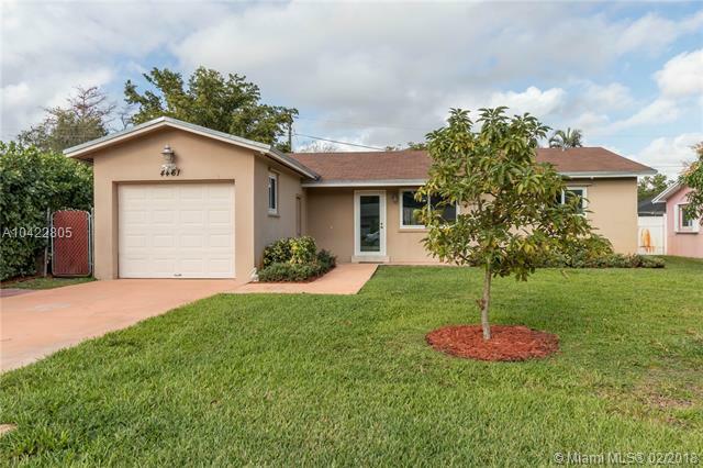 Property Photo:  4461 SW 24th Ave  FL 33312 