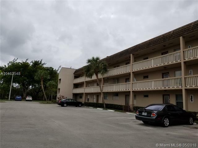 Property Photo:  5841 NW 61st Ave 207  FL 33319 