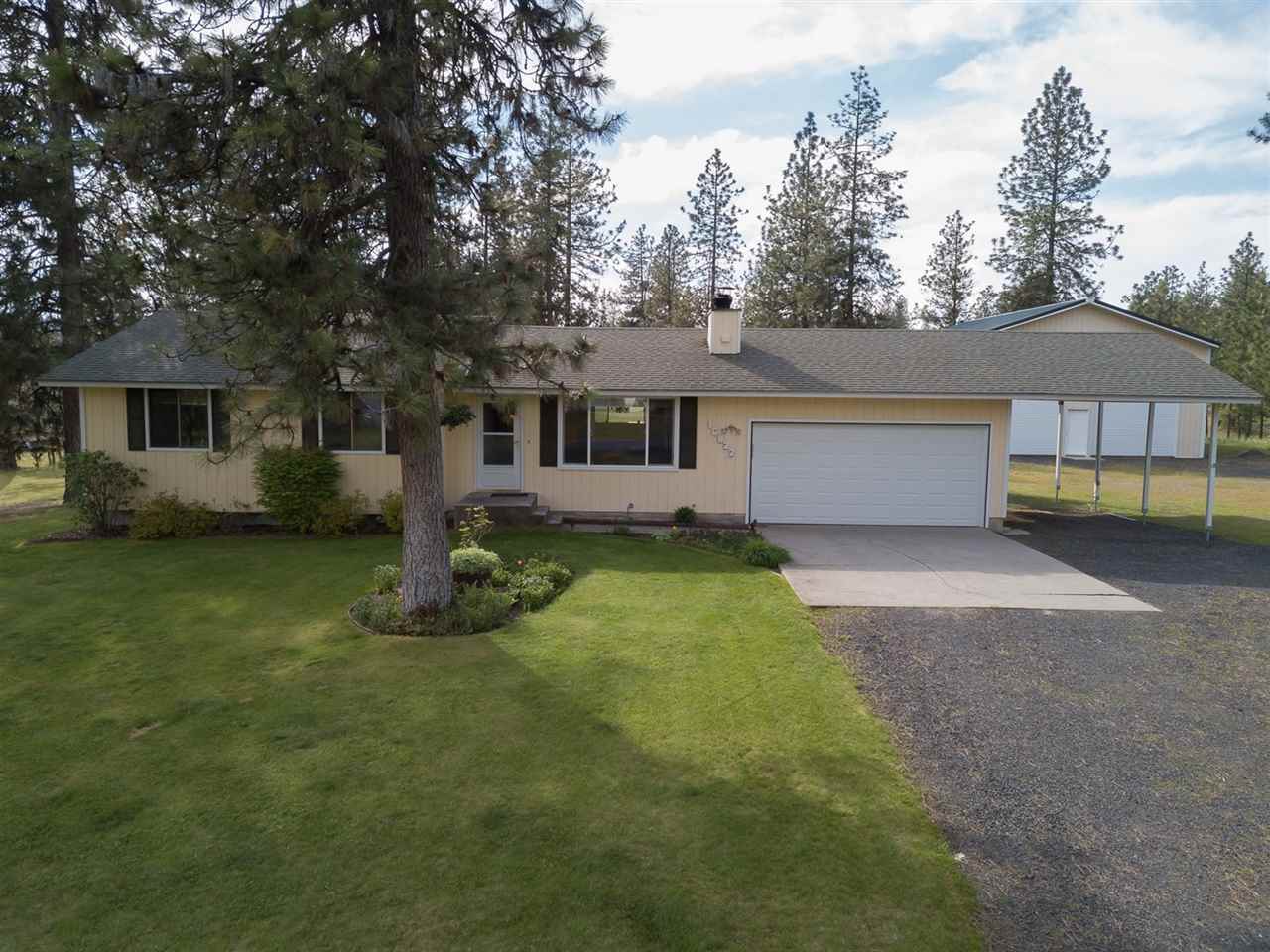 Property Photo: 16822 N Columbine Ct WA 99026-9338