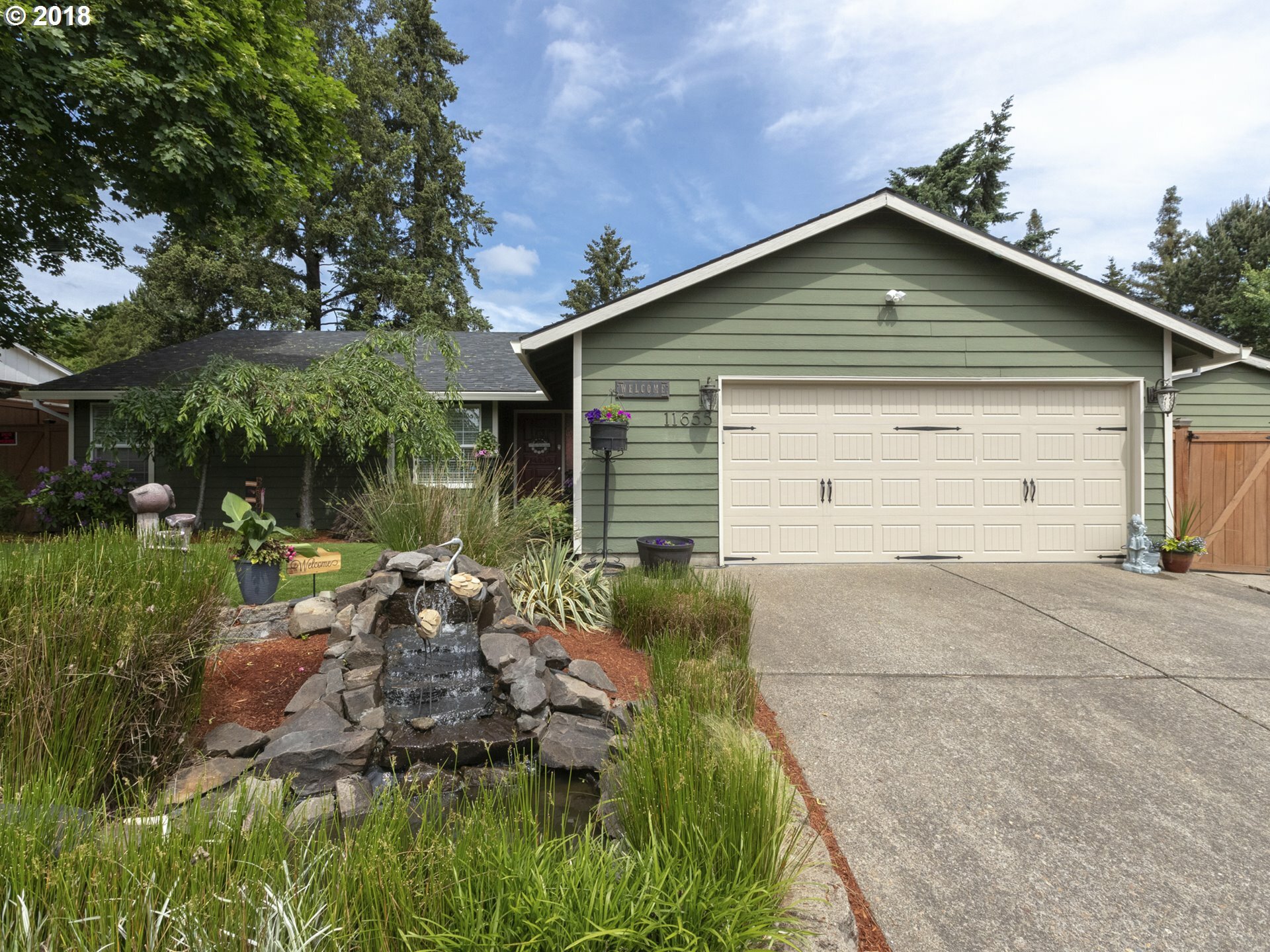 Property Photo:  11655 SW Springwood Dr  OR 97223 