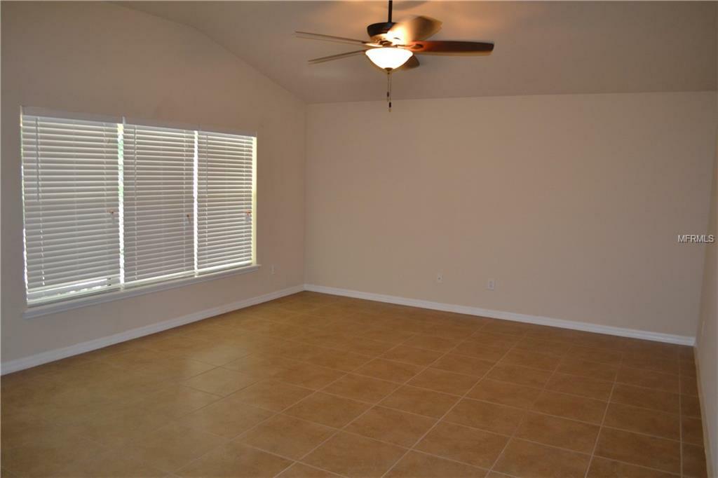 Property Photo:  11127 Lemay Drive  FL 34711 