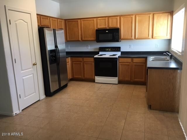 Property Photo:  11590 W Jackson Street  AZ 85323 