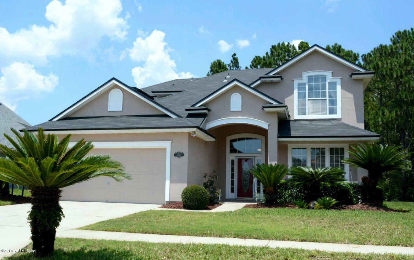 Property Photo:  8687 Canopy Oaks Drive  FL 32256 