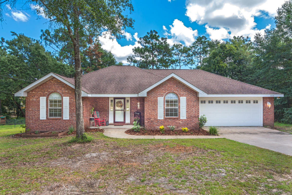 Property Photo:  5735 Mansfield Drive  FL 32536 