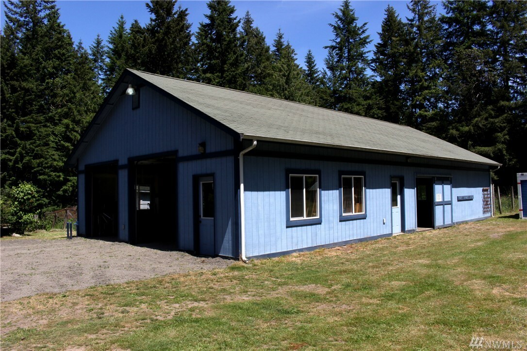Property Photo:  7607 SE Pinecreek Lane  WA 98367 