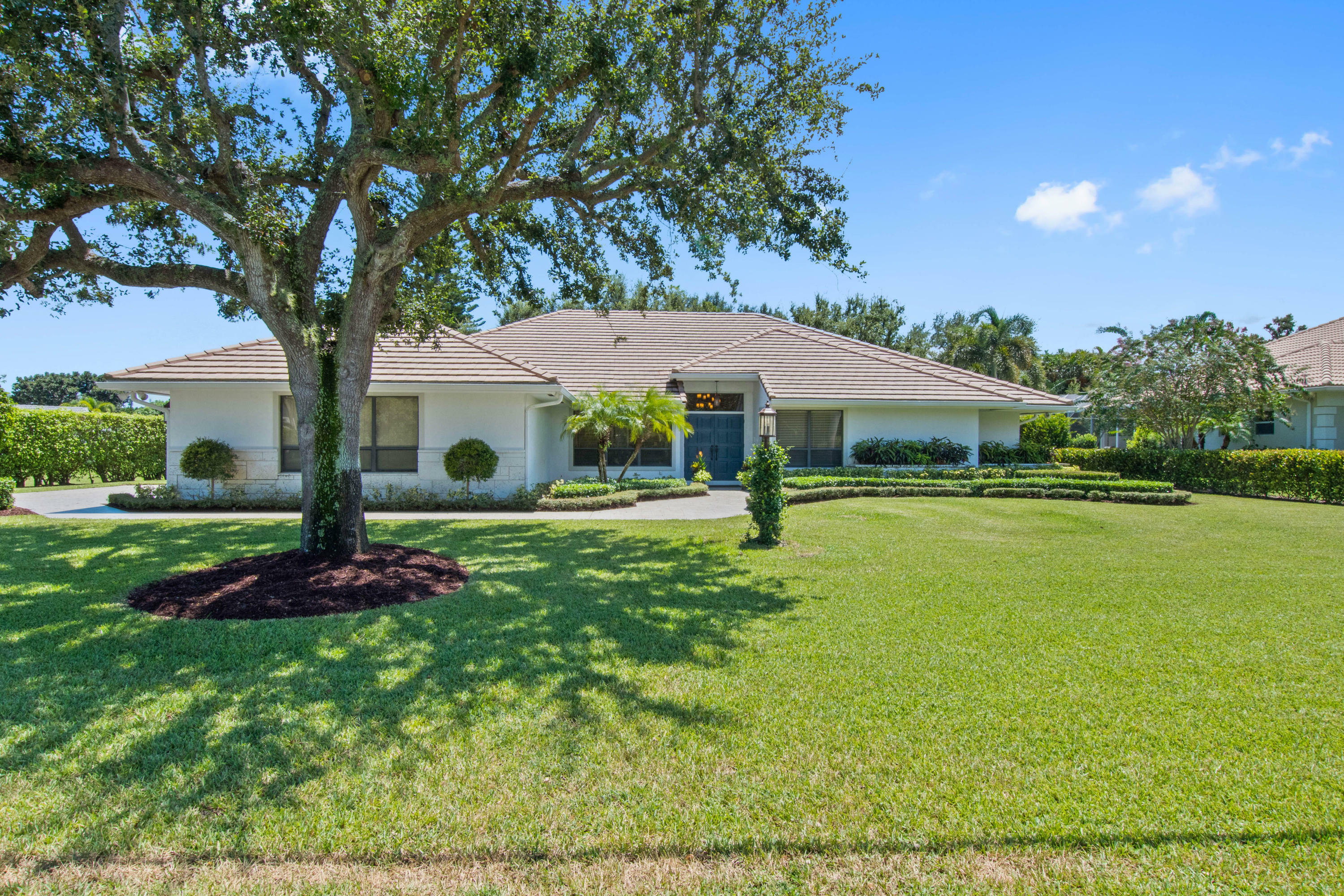Property Photo:  4376 Pine Tree Drive  FL 33436 