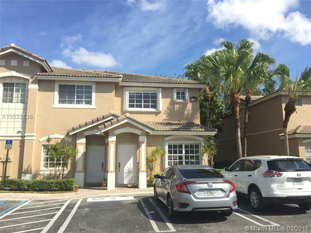 Property Photo: 5761 NW 115th Ct 110 FL 33178