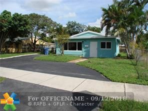 Property Photo:  631 NE 56th St  FL 33334 