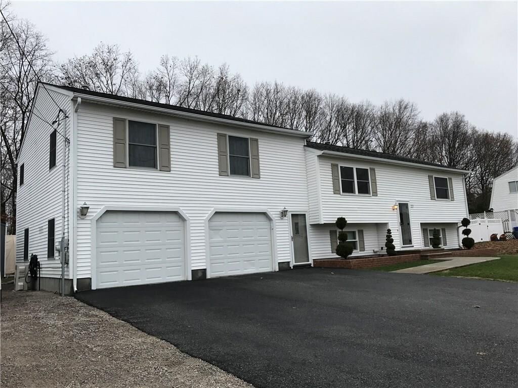 Property Photo:  27 Medieval Wy  RI 02893 