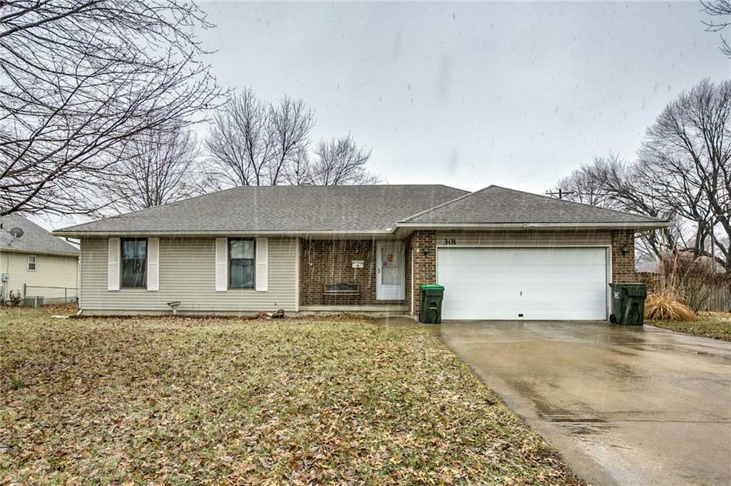 Property Photo:  301 S Johnson Drive  MO 64076 