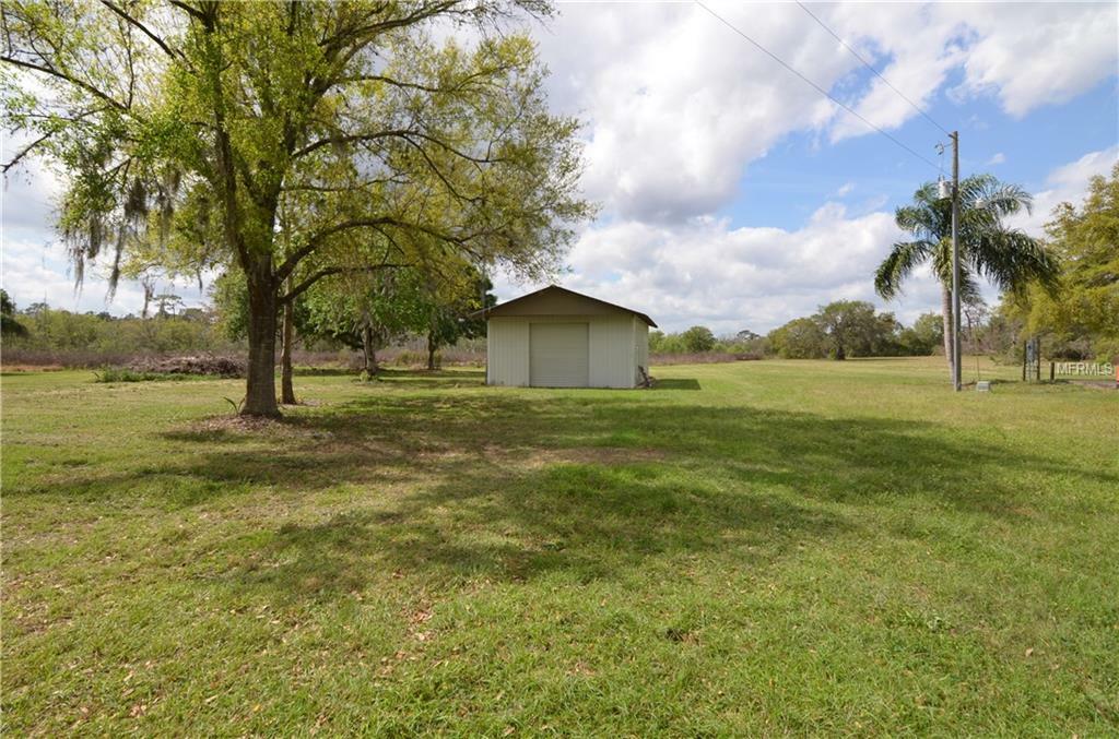 Property Photo:  7411 Groveland Farms Road  FL 34736 