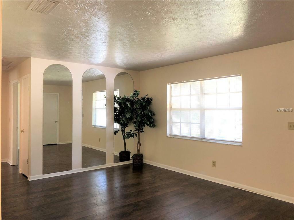 Property Photo:  7714 Brettonwood Drive  FL 33615 