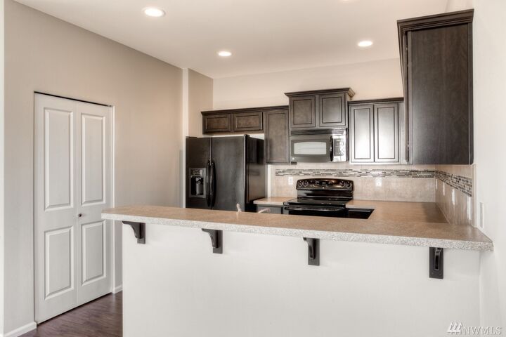 Property Photo:  204 Basil Ave 42  WA 98584 