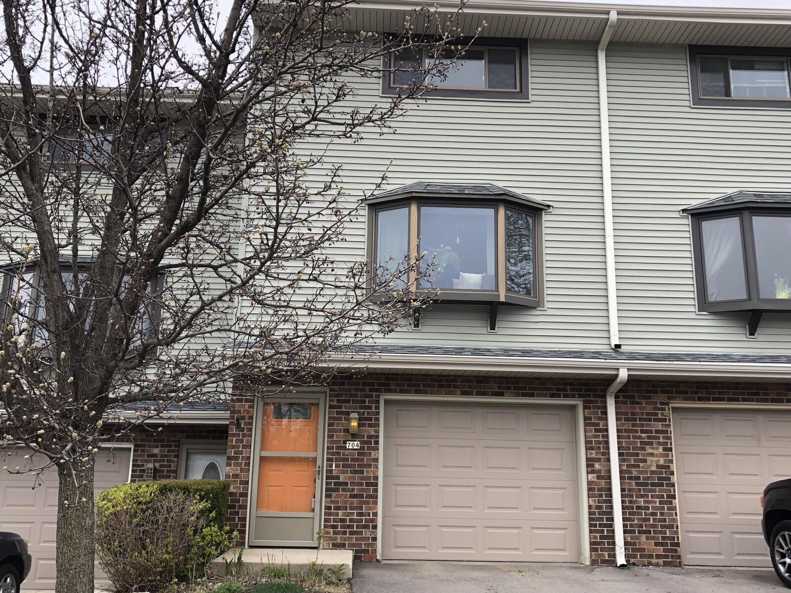 Property Photo:  704 Tamarack Dr E  WI 53095 