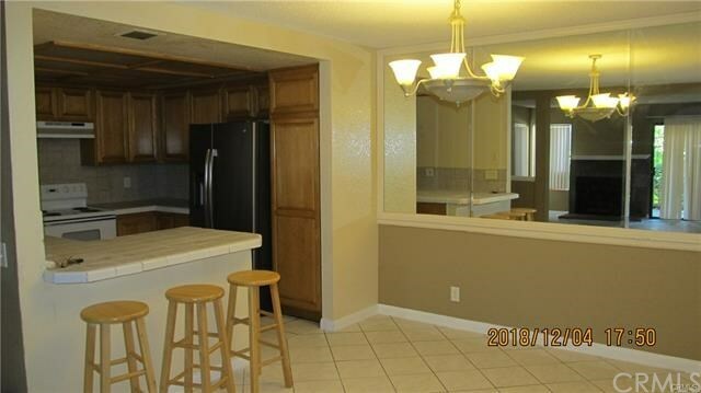 Property Photo:  16581 Grunion 1  CA 92649 