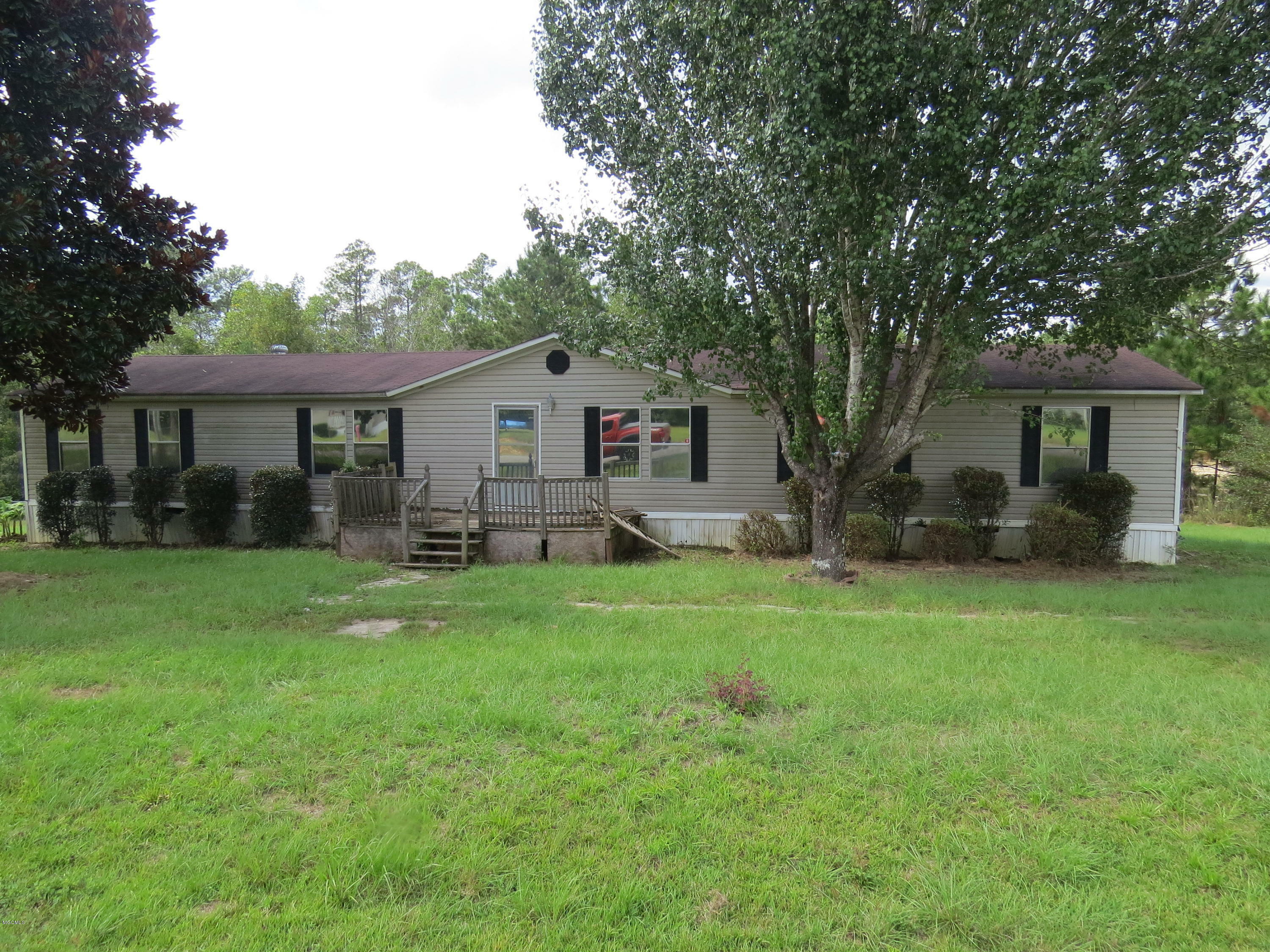 Property Photo: 19080 Palmer Creek Drive MS 39574