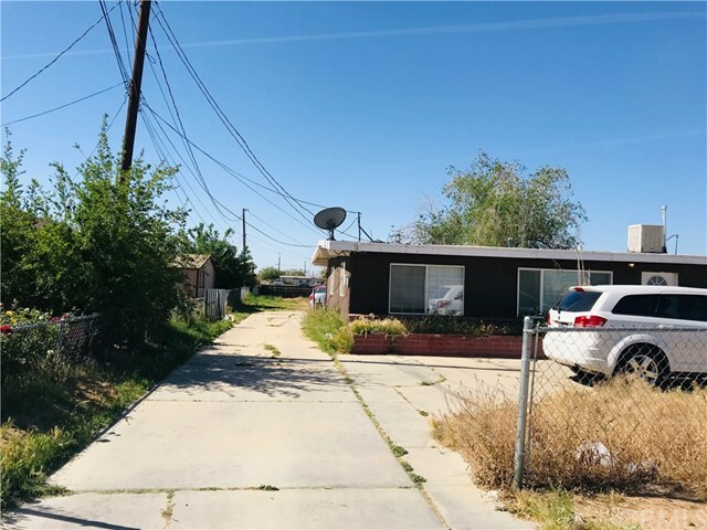 Property Photo:  11861 White Avenue  CA 92301 