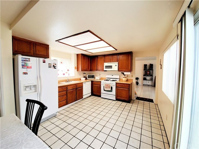 Property Photo:  13986 El Contento Avenue  CA 92337 