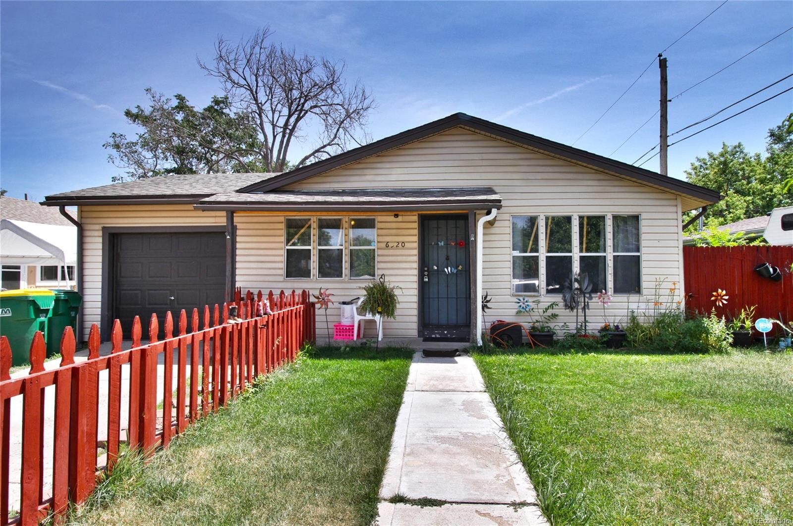 Property Photo:  6220 Olive Street  CO 80022 