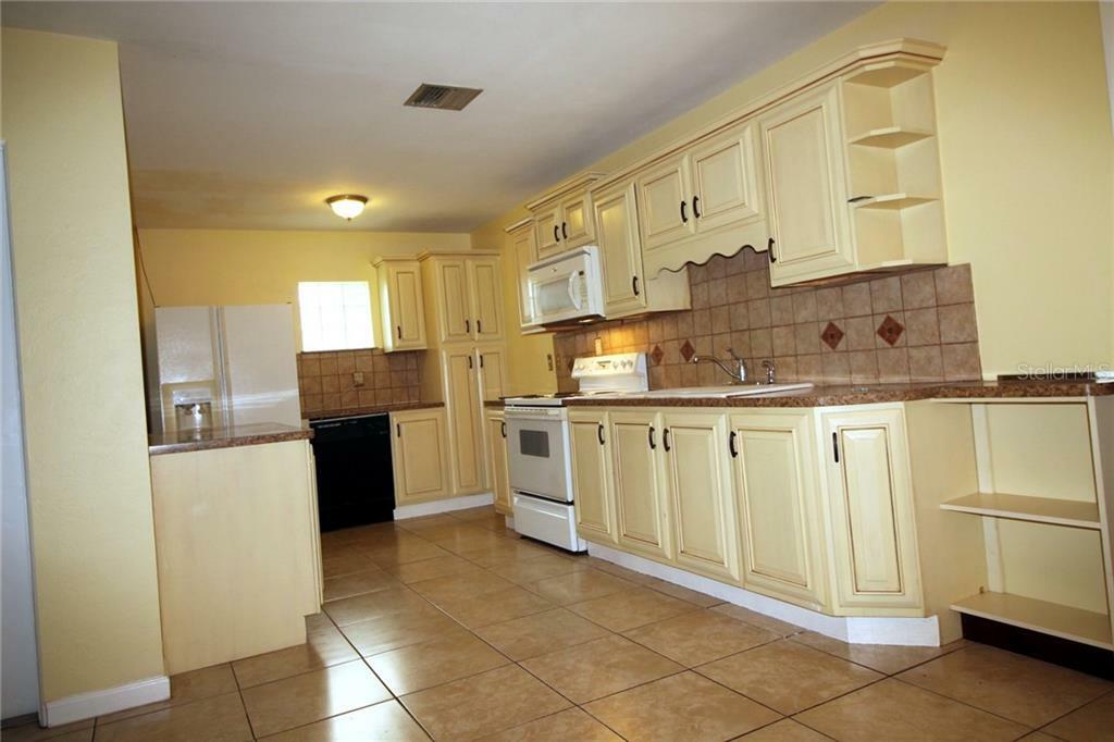 Property Photo:  1142 Seminole Street  FL 34711 