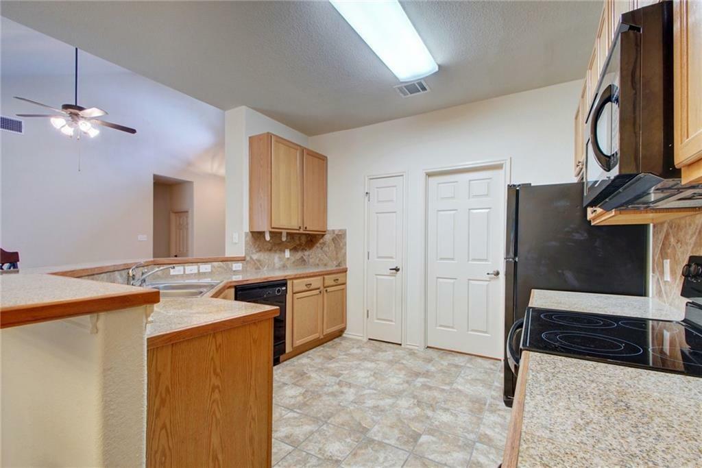 Property Photo:  2410 Great Oaks Drive 204  TX 78681 