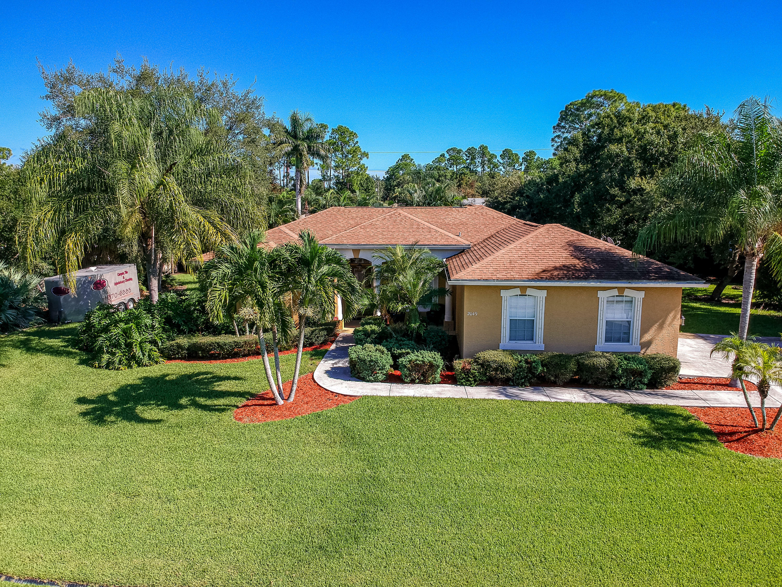 Property Photo:  2049 SW Justison Avenue  FL 34953 