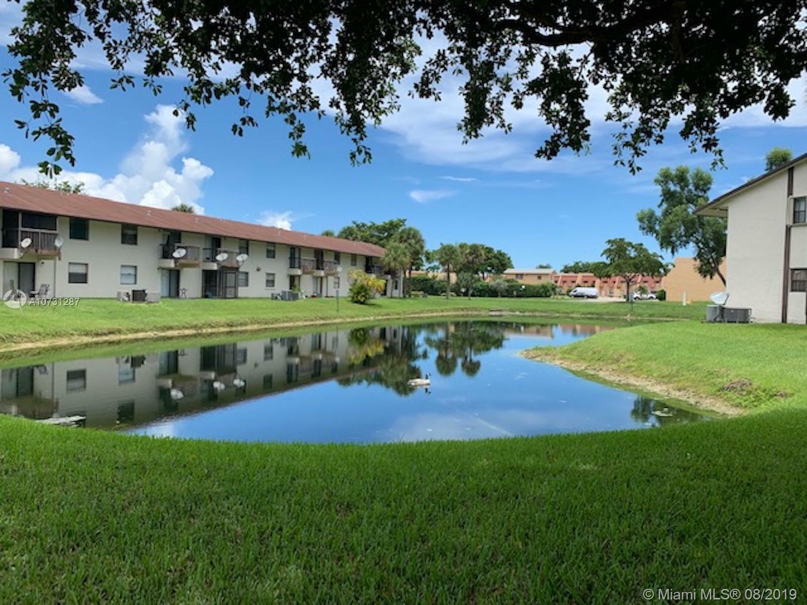 Property Photo:  6061 Shakerwood Cir 206  FL 33319 