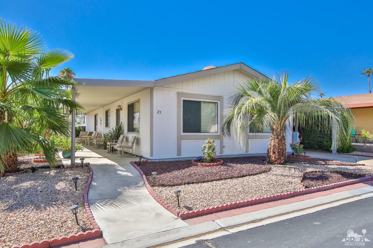 Property Photo:  73450 Country Club Drive 23  CA 92260 